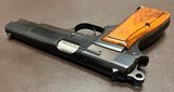 PRISTINE ORIGINAL CONDITION BROWNING HI POWER T SERIES 9MM PISTOL THREE MAGAZINES, ORIGINAL POUCH, & OWNERS MANUAL BUILT IN 1969 - Image 8 of 9