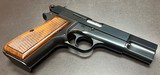 PRISTINE ORIGINAL CONDITION BROWNING HI POWER T SERIES 9MM PISTOL THREE MAGAZINES, ORIGINAL POUCH, & OWNERS MANUAL BUILT IN 1969 - Image 6 of 9