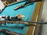 Remington Model 597 Cam0 Semi- auto 22 Rifle - 2 of 2