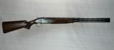 Browning GTI Sporter Ultra Plus 12-GA with black receiver with nice straight grained wood - 1 of 6