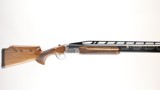 Caesar Guerini Summit Trap, 12ga, 2 3/4 in chambers, 32 in barrels, adjustable high rib, adjustable comb