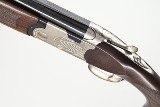 Left handed Beretta 686E Multi Choke, 12 Ga, 30