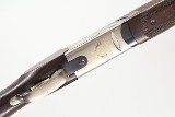 Left handed Beretta 686E Multi Choke, 12 Ga, 30