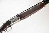 Left handed Beretta 686E Multi Choke, 12 Ga, 30