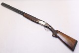 Left handed Beretta 686E Multi Choke, 12 Ga, 30