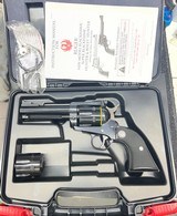 New Model Ruger Blackhawk with 357 Magnum and 9mm Cylinders - Image 1 of 13