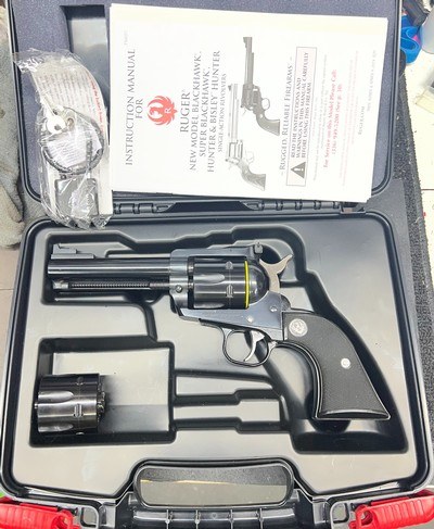 New Model Ruger Blackhawk with 357 Magnum and 9mm Cylinders - Image 1 of 13