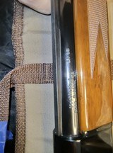 Weatherby semi auto sa-08.
28GA - 8 of 15