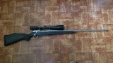 Weatherby 300 magnum rifle. Mark V. Stainless steel rifle.