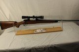 Winchester Model 70 per 64 Super Grade with Leupold 2.5 x 8 VIII Scope .338 Win Mag