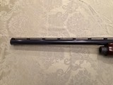 Remington 1100 12 ga. 2 3/4 in.
VR, choke tubed. - 12 of 15