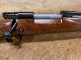FREE SAFARI, WINCHESTER 70 SUPER GRADE FANCY WOOD 7mm REMINGTON MAGNUM 535203230 - 1 of 24