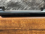 FREE SAFARI, NEW WINCHESTER MODEL 70 SUPER GRADE FRENCH WALNUT 7MM REM MAG 26