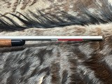 FREE SAFARI, NEW WINCHESTER MODEL 70 SUPER GRADE STAINLESS 243 WIN 22