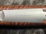 FREE SAFARI, NEW WINCHESTER MODEL 70 SUPER GRADE STAINLESS 243 WIN 22