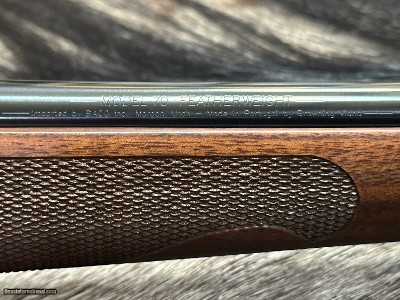 FREE SAFARI, NEW WINCHESTER MODEL 70 FEATHERWEIGHT 300 WSM 24