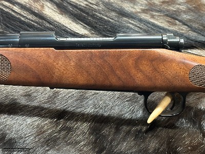 FREE SAFARI, NEW WINCHESTER MODEL 70 FEATHERWEIGHT 300 WSM 24