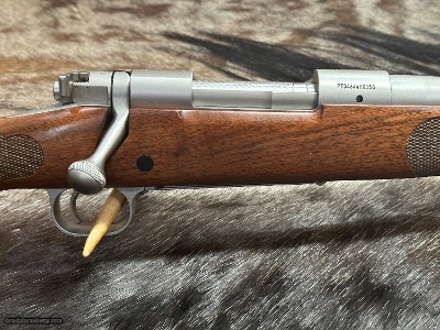 FREE SAFARI, NEW WINCHESTER MODEL 70 STAINLESS STEEL FEATHERWEIGHT 300 WSM 24