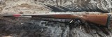 FREE SAFARI, NEW WINCHESTER MODEL 70 STAINLESS STEEL FEATHERWEIGHT 300 WSM 24