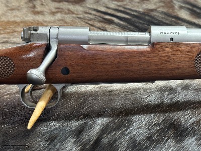 FREE SAFARI, NEW WINCHESTER MODEL 70 STAINLESS STEEL FEATHERWEIGHT 300 WSM 24