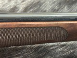 FREE SAFARI, NEW WINCHESTER MODEL 70 FEATHERWEIGHT 6.5 PRC WITH GOOD WOOD 24