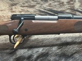 FREE SAFARI, NEW WINCHESTER MODEL 70 FEATHERWEIGHT 6.5 PRC WITH GOOD WOOD 24