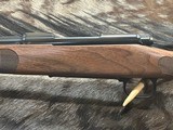 FREE SAFARI, NEW WINCHESTER MODEL 70 FEATHERWEIGHT 6.5 PRC WITH GOOD WOOD 24