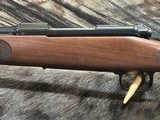 FREE SAFARI, NEW WINCHESTER MODEL 70 FEATHERWEIGHT 6.5 CREEDMOOR 22