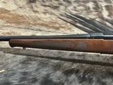 FREE SAFARI, NEW WINCHESTER MODEL 70 FEATHERWEIGHT 300 WSM (WIN SHORT MAG) WITH GOOD WOOD STOCK 22