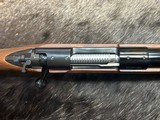 FREE SAFARI, NEW WINCHESTER MODEL 70 FEATHERWEIGHT 300 WSM (WIN SHORT MAG) WITH GOOD WOOD STOCK 22