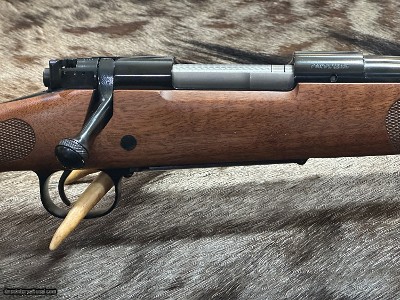 FREE SAFARI, NEW WINCHESTER MODEL 70 FEATHERWEIGHT 300 WSM (WIN SHORT MAG) 22