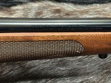 FREE SAFARI, NEW WINCHESTER MODEL 70 FEATHERWEIGHT 300 WIN MAG RIFLE 22