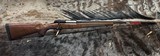 FREE SAFARI, NEW WINCHESTER MODEL 70 FEATHERWEIGHT 300 WIN MAG RIFLE 22