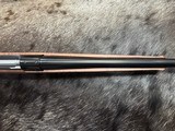 FREE SAFARI, NEW WINCHESTER MODEL 70 FEATHERWEIGHT 300 WIN MAG RIFLE 22