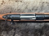 FREE SAFARI, NEW WINCHESTER MODEL 70 FEATHERWEIGHT 300 WIN MAG RIFLE 22