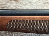 FREE SAFARI, NEW WINCHESTER MODEL 70 FEATHERWEIGHT 300 WIN MAG RIFLE 22