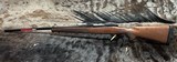 FREE SAFARI, NEW WINCHESTER MODEL 70 FEATHERWEIGHT 300 WIN MAG RIFLE 22