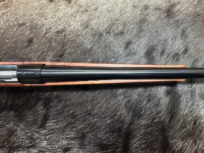 FREE SAFARI, NEW WINCHESTER MODEL 70 FEATHERWEIGHT 300 WIN MAG RIFLE 24