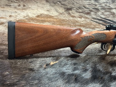 FREE SAFARI, NEW WINCHESTER MODEL 70 FEATHERWEIGHT 300 WIN MAG RIFLE 24