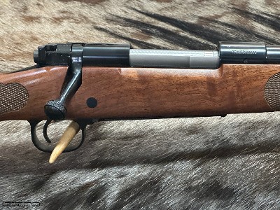 FREE SAFARI, NEW WINCHESTER MODEL 70 FEATHERWEIGHT 300 WIN MAG RIFLE 22