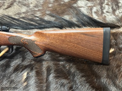 FREE SAFARI, NEW WINCHESTER MODEL 70 FEATHERWEIGHT 300 WIN MAG RIFLE 24