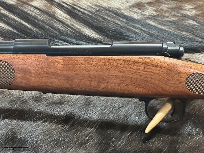 FREE SAFARI, NEW WINCHESTER MODEL 70 FEATHERWEIGHT 300 WIN MAG RIFLE 24