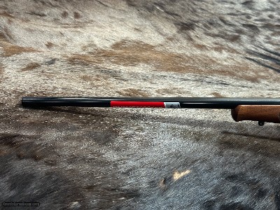 FREE SAFARI, NEW WINCHESTER MODEL 70 FEATHERWEIGHT 300 WIN MAG RIFLE 24