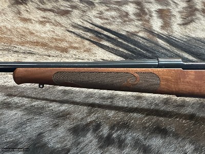 FREE SAFARI, NEW WINCHESTER MODEL 70 FEATHERWEIGHT 300 WIN MAG RIFLE 24