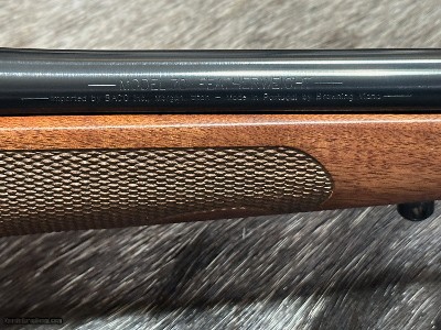 FREE SAFARI, NEW WINCHESTER MODEL 70 FEATHERWEIGHT 300 WIN MAG RIFLE 24