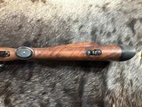 FREE SAFARI, NEW WINCHESTER MODEL 70 SUPER GRADE 300 WIN MAG 24