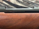 FREE SAFARI, NEW WINCHESTER MODEL 70 SUPER GRADE 300 WIN MAG 24