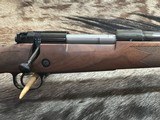 FREE SAFARI, NEW WINCHESTER MODEL 70 SUPER GRADE 300 WIN MAG 24