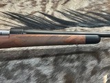 FREE SAFARI, NEW WINCHESTER MODEL 70 SUPER GRADE 300 WIN MAG 24