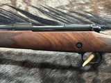 FREE SAFARI, NEW WINCHESTER MODEL 70 SUPER GRADE 300 WIN MAG 24